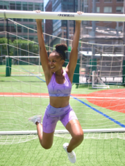 Lukafit Squatproof Biker Shorts Lavender Ombre Model Swinging on Goal Post